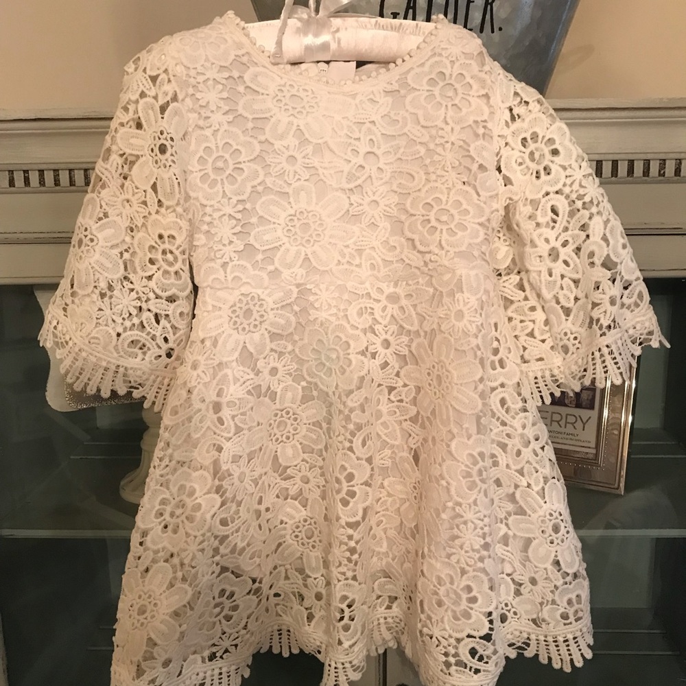 White eyelet dress with bell sleeves